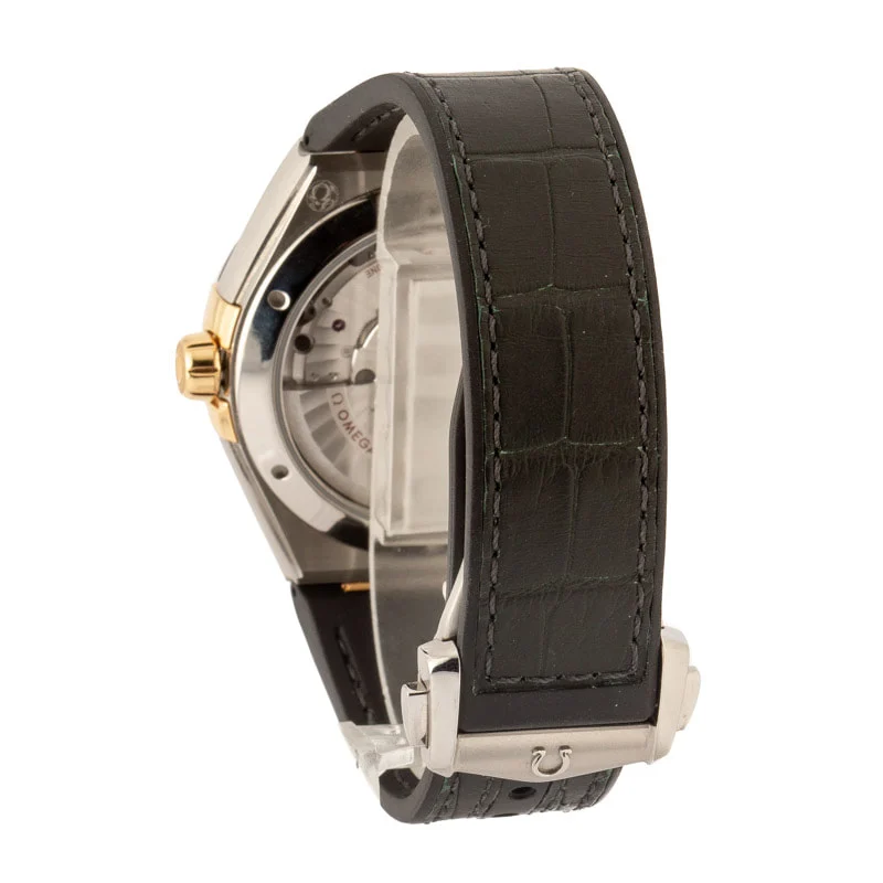 omega constellation steel & yellow gold green dial